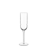 A single clear Grandioso champagne flute with a long stem, designed for serving sparkling wine made from high-tech crystal glass on a white background.