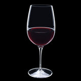 Vinoteque Riserva Red Wine Glass filled with red wine on a black background