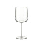A clear Grandioso Merlot wine glass with a long stem, suitable for serving red wine on a white background