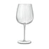 A clear, sophisticated Jenever Gin glass with vertical ridges, featuring a thin stem and flat foot on a white background