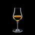Vinoteque Snifter glass filled with a spirit on a black background